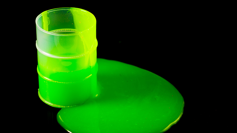 sheer thickening liquid called Oobleck spilling out of a small plastic container