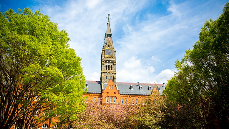 Georgetown's Healy Tower peeking out of trees