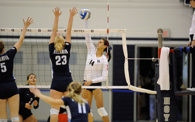 Georgetown volleyball team member Brooke Bachesta (C’14) goes for a spike during a regular season game.
