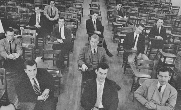 Antonin Scalia, sixth row to the left, sits with his fellow Mask and Bauble drama club members in a black and white photo.