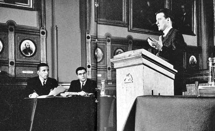 Antonin Scalia, sitting at right, looks on during a Philodemic Debate Society meeting.