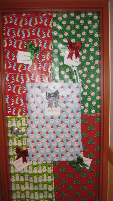 Wrapping paper on the door of a dorm room.