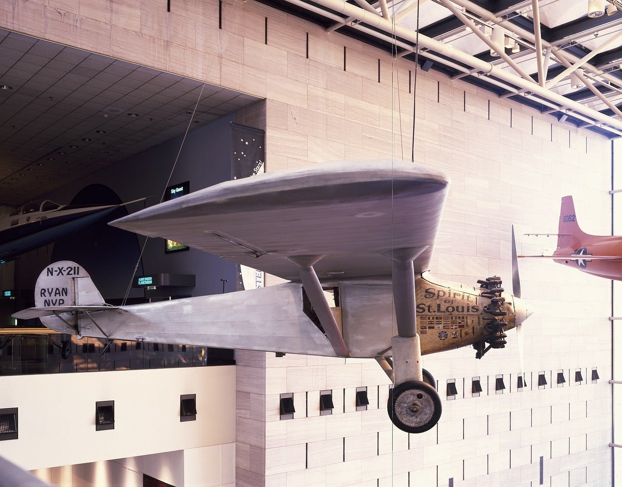 An airplane hangs in the Air and Space Museum