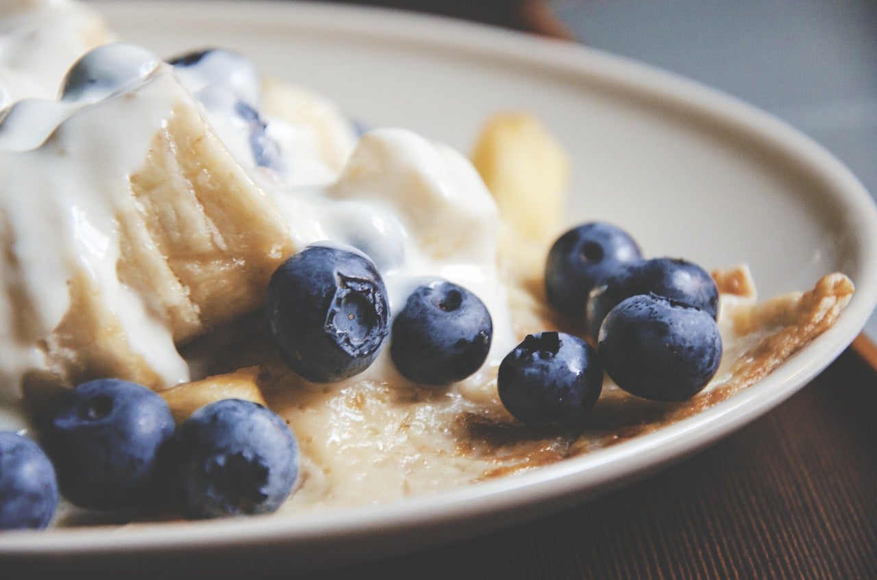 Close-up of pancakes and fruit