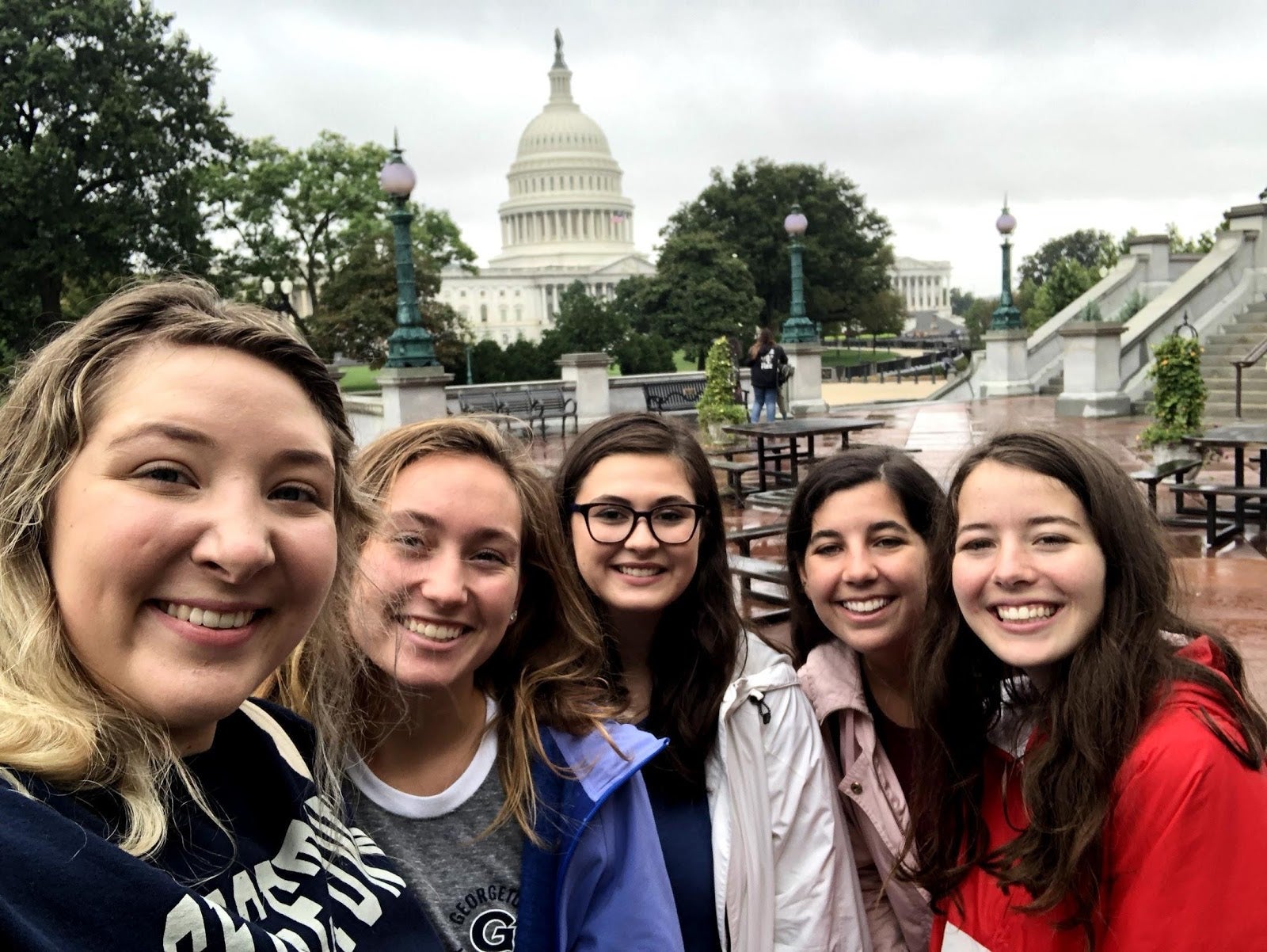 A group of students smile at the camera on Capitol Hill