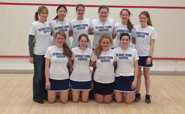 Georgetown Women's Squash Team poses on court