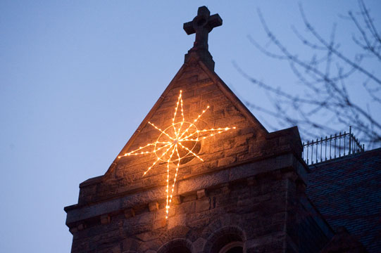 A photo of the electric star on top of Healy Hall.