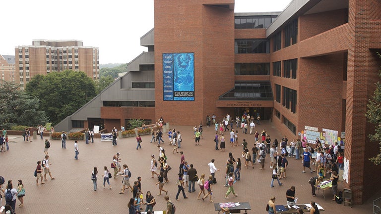 The Intercultural Center seen from above with students milling about