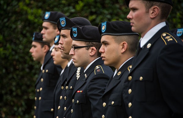 Members of the Hoya Battalion, Georgetown's Army ROTC program in military uniforms stand during the ceremony.